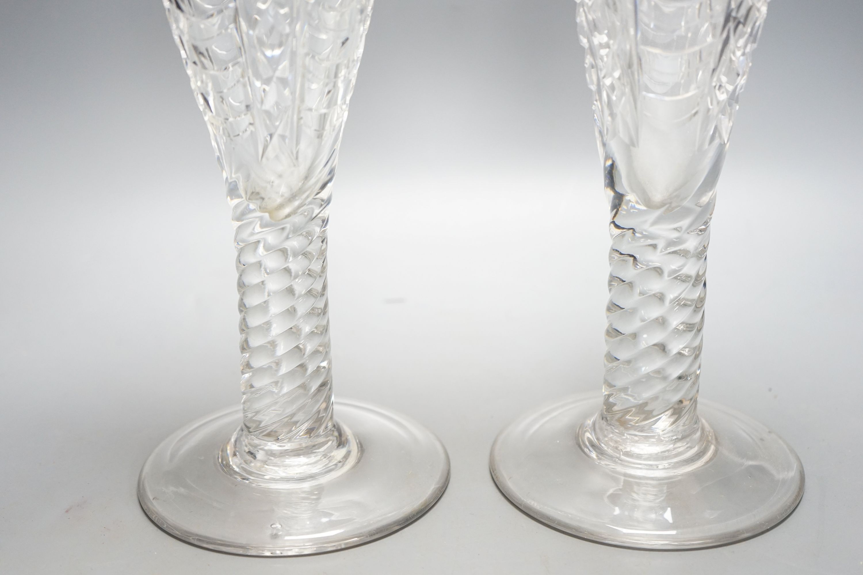 A pair of 19th century large glass goblets or vases, each on spiral-twist stem and circular foot with pontil mark 30cm